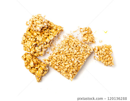 Puffed rice bar isolated, sweet wheat kozinaki, puff cereal block pieces, sugar crispy wheat bar, healthy popped dessert Puffed rice bar isolated, sweet wheat kozinaki, puff cereal block pieces, sugar crispy wheat bar, healthy popped dessert 120136288