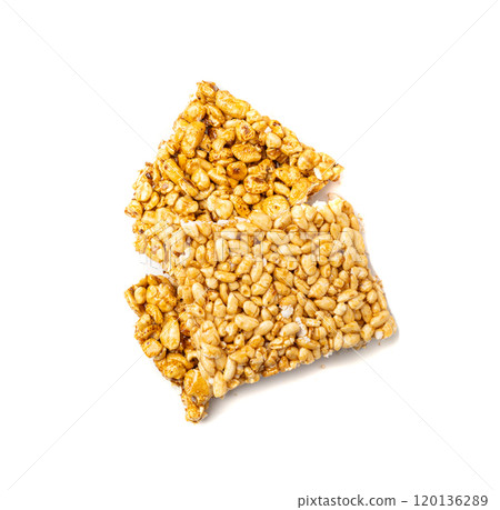 Puffed rice bar isolated, sweet wheat kozinaki, puff cereal block pieces, sugar crispy wheat bar, healthy popped dessert Puffed rice bar isolated, sweet wheat kozinaki, puff cereal block pieces, sugar crispy wheat bar, healthy popped dessert 120136289