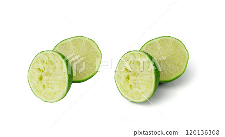 Squeezed lime, squeezing out half green lemon, squeezed lime juice on white background, burnout symbol Squeezed lime, squeezing out half green lemon, squeezed lime juice on white background, burnout symbol 120136308