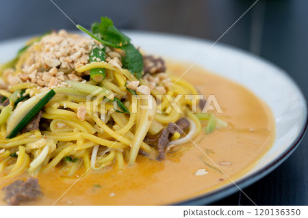 Chiang mai curry noodles, asian spicy egg pasta with meat, curried noodle soup Khao Soi or Khao Sawy, thai?food Chiang mai curry noodles, asian spicy egg pasta with meat, curried noodle soup Khao Soi or Khao Sawy, thai?food 120136350