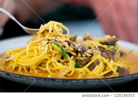 Chiang mai curry noodles, asian spicy egg pasta with meat, curried noodle soup Khao Soi or Khao Sawy, thai?food Chiang mai curry noodles, asian spicy egg pasta with meat, curried noodle soup Khao Soi or Khao Sawy, thai?food 120136353