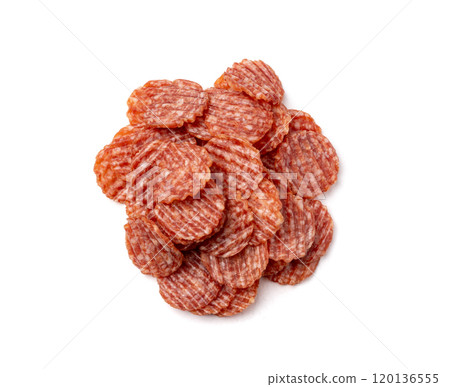 Salami chips isolated, wavy sausage slices, sliced dry chorizo, sausages thin pieces, pepperoni pizza ingredient 120136555
