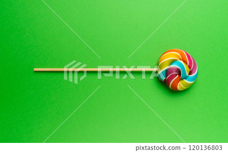 Color lollipop, spiral candy on stick, colorful striped lollypop, round fruit caramel, circle lollipop 120136803