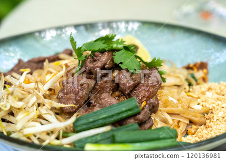 Pad thai,?phat thai, or?phad tha asian noodles, chinese rice pasta with meat in thailand restaurant table 120136981
