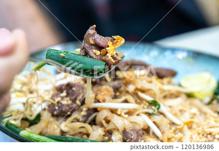 Pad thai,?phat thai, or?phad tha asian noodles, chinese rice pasta with meat in thailand restaurant table 120136986