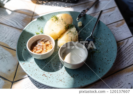 Lithuanian potato dumplings, cepelinai pancakes or kolduny, meat stuffed draniki, traditional didzkukuliai 120137607