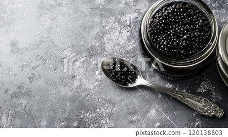 Black Caviar in Glass Jar with Silver Spoon 120138803