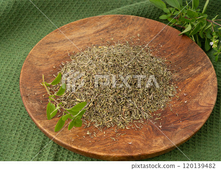 Dry thyme pile, dried marjoram, oregano heap, ground crushed thyme seasoning, thyme leaves Dry thyme pile, dried marjoram, oregano heap, ground crushed thyme seasoning, thyme leaves 120139482