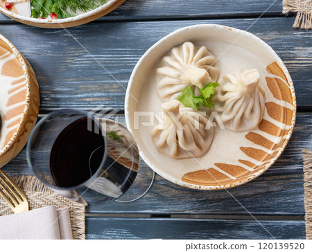 Georgian khinkali, minced meat chinkali, spicy dumplings also called dimsum, momo, jiaozi, manti 120139520