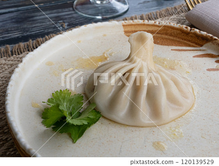 Georgian khinkali, minced meat chinkali, spicy dumplings also called dimsum, momo, jiaozi, manti 120139529