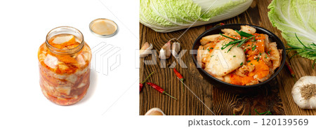 Kimchee in black bowl on wood table. Spicy kim chi pile, hot fermented napa cabbage, traditional jimchi Kimchee in black bowl on wood table. Spicy kim chi pile, hot fermented napa cabbage, traditional jimchi 120139569