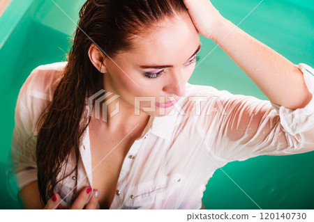 Sexual posing woman in water. 120140730
