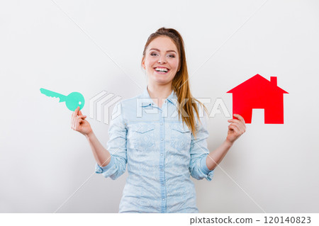 Woman and paper house. Housing real estate concept Woman and paper house. Housing real estate concept 120140823