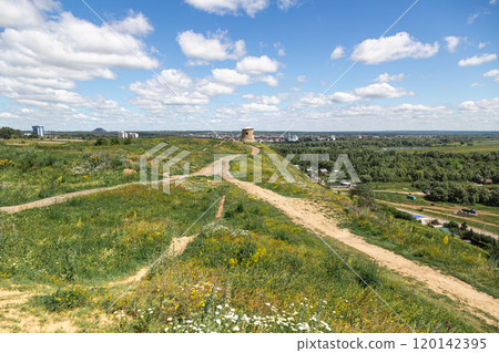 The tower of an ancient Bulgarian fortress on a high cliff on the banks of the Kama River, Elabuga, Tatarstan, Russian Federation 120142395