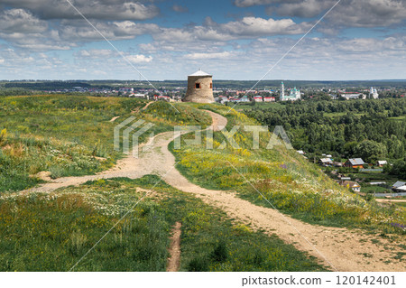 The tower of an ancient Bulgarian fortress on a high cliff on the banks of the Kama River, Elabuga, Tatarstan, Russian Federation The tower of an ancient Bulgarian fortress on a high cliff on the banks of the Kama River, Elabuga, Tatarstan, Russian Federation 120142401