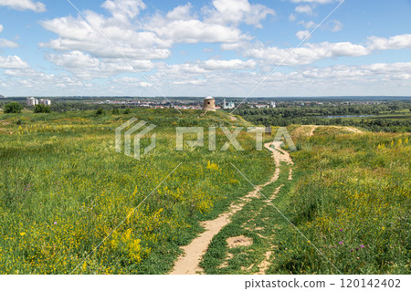 The tower of an ancient Bulgarian fortress on a high cliff on the banks of the Kama River, Elabuga, Tatarstan, Russian Federation 120142402