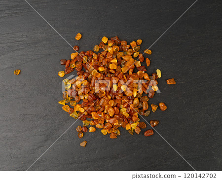 Amber stones, polished orange gemstones, natural Baltic amber gems, golden fossilized tree resin 120142702