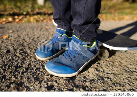 Children's anatomical shoes. A child skates in comfortable barefoot sneakers with a wide toe. Lots of room for the foot Children's anatomical shoes. A child skates in comfortable barefoot sneakers with a wide toe. Lots of room for the foot 120143060