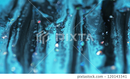 Shiny ink spill. Acrylic paint. Defocused blue black color holographic glitter particles floating bubbles dye liquid mix fluid flow abstract art background. 120143341