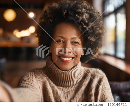 Happy Moments in Coffee Shop Mature Woman Influencer Vlogging or Taking Selfie in Coffee Shop 120144711