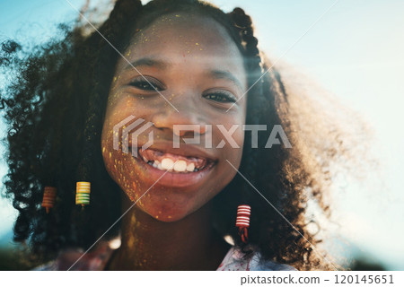 Making art, be back later. Shot of a teenage girl having fun with colourful powder at summer camp. 120145651