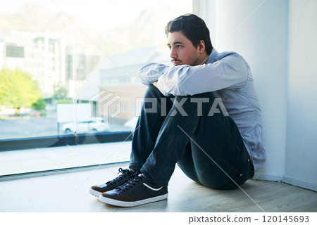 Its hard to heal when youve withdrawn from the world. Shot of a young man suffering from a mental breakdown. Its hard to heal when youve withdrawn from the world. Shot of a young man suffering from a mental breakdown. 120145693