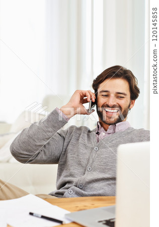 Hello, weekend Is that you. A handsome businessman speaking on his mobile at his desk. Hello, weekend Is that you. A handsome businessman speaking on his mobile at his desk. 120145858
