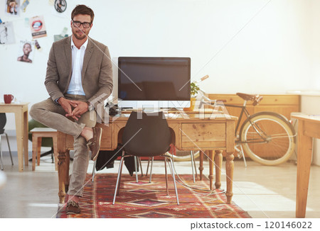 Ill get the job done. Portrait of a young male designer in his modern office. 120146022
