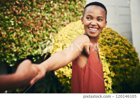 Lets run away from it all. Cropped shot of a happy young woman pulling her partner by the hand. Lets run away from it all. Cropped shot of a happy young woman pulling her partner by the hand. 120146105