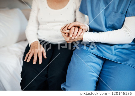 Life is easier with someone by our side. Cropped shot of a nurse holding hands with a senior woman. Life is easier with someone by our side. Cropped shot of a nurse holding hands with a senior woman. 120146186