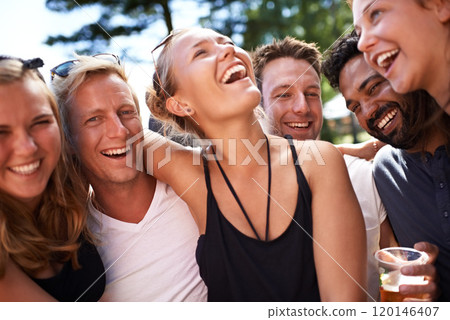 Laughter brings them closer. Cropped shot of friends at the Skanderborg festival. 120146407