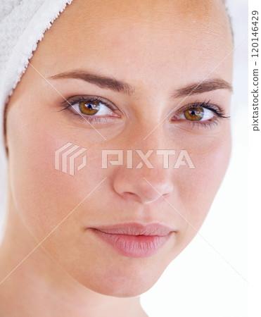 Confident and composed. Close up shot of a stunning woman with a flawless complexion. Confident and composed. Close up shot of a stunning woman with a flawless complexion. 120146429