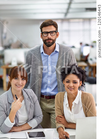 Dynamic young office professionals. Portrait of a group of dedicated and dynamic design professionals. Dynamic young office professionals. Portrait of a group of dedicated and dynamic design professionals. 120146443