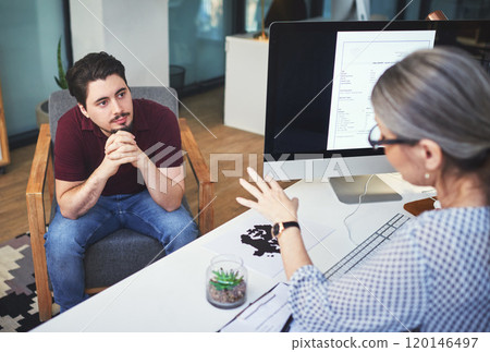 When you click with your counsellor, healing can begin. Shot of a young man having a therapeutic session with a psychologist. When you click with your counsellor, healing can begin. Shot of a young man having a therapeutic session with a psychologist. 120146497