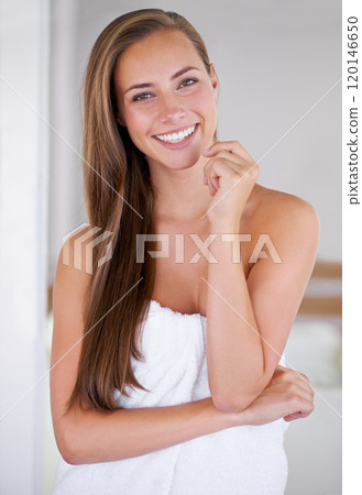 You wish you had hair like mine. Front view of a woman with long healthy hair. 120146650