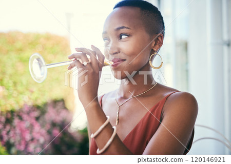 Theres always time for champagne. Cropped shot of a young woman drinking a glass of champagne outside. 120146921