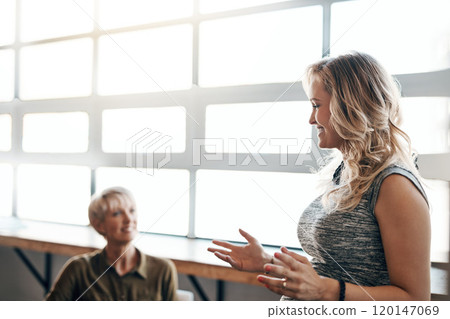 Shes all about the bottom line. Shot of a pregnant businesswoman giving a presentation in the boardroom. Shes all about the bottom line. Shot of a pregnant businesswoman giving a presentation in the boardroom. 120147069