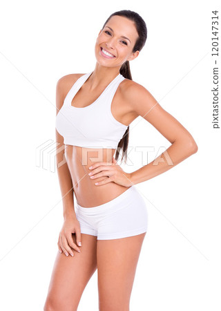 Feeling awesome and looking even better. Studio portraitt of a fit young woman isolated on white. 120147314