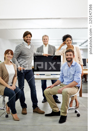 We are the best in our business. Portrait of a group of dedicated and dynamic design professionals. 120147366