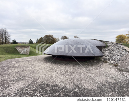 Abandoned military bunker hidden deep in the forest between the rocks . Lithuania 120147581