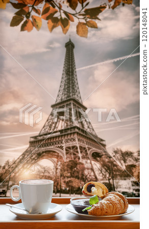 Coffee with croissants with symbol of Eiffel Tower in Paris, France 120148041