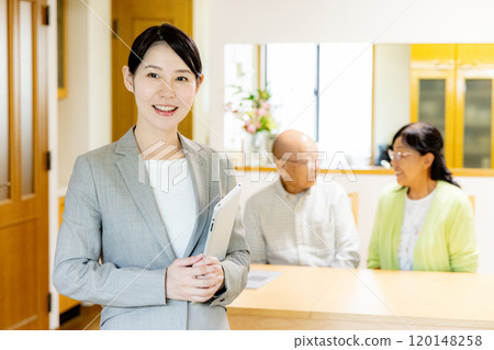 Young female salesperson Young female salesperson 120148258