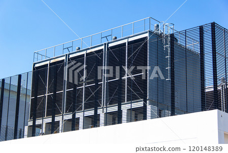 Industrial air conditioning units on a rooftop. Industrial air conditioning units on a rooftop. 120148389