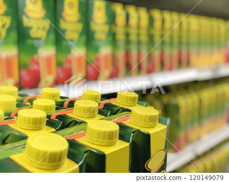 blurred supermarket background with beverage card boxes 120149079