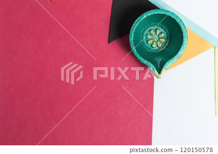 Blank Colored Paper Note with Festive Diya and Decorative Flag on White Background. Diwali Celebration. Place for text. 120150578