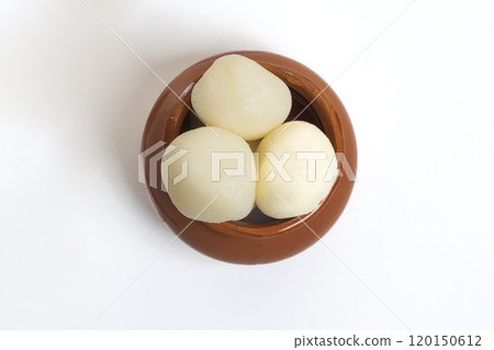 Top View of Traditional Indian Sweet Rasgulla in Clay Pot on White Background 120150612