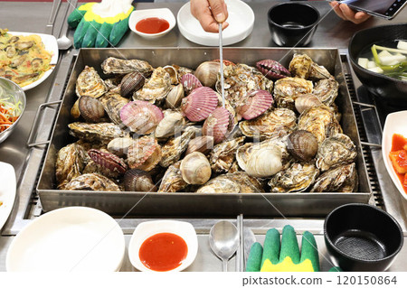 Korean Seafood Food. Steamed oysters and clams Korean Seafood Food. Steamed oysters and clams 120150864