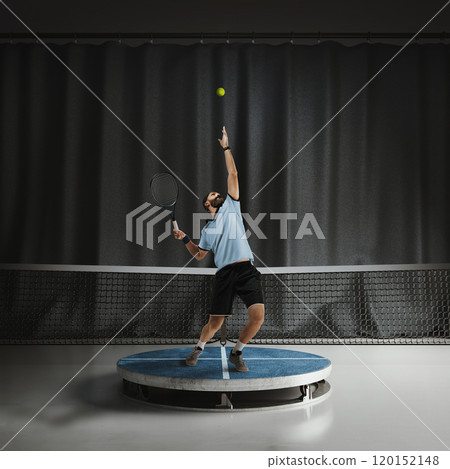 Dynamic image of focused bearded man, tennis player standing on 3D round platform and serving ball with racket. 120152148
