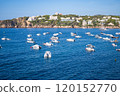 Yachts Anchored Along the Spanish Coastline Mediterranean Seaside View.vibrant photo of yachts and 120152770