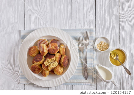 Northern Pike fish cakes in a white bowl Northern Pike fish cakes in a white bowl 120154137
